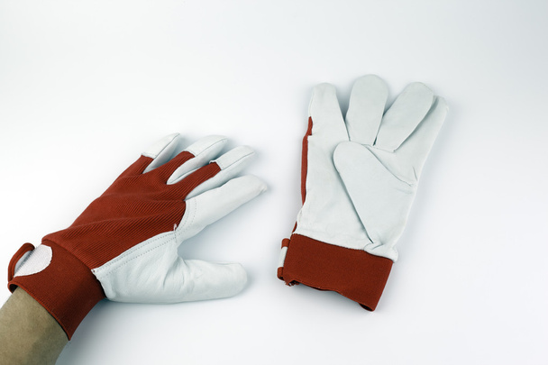 Шкіряні робочі рукавички на білому тлі
 - Фото, зображення