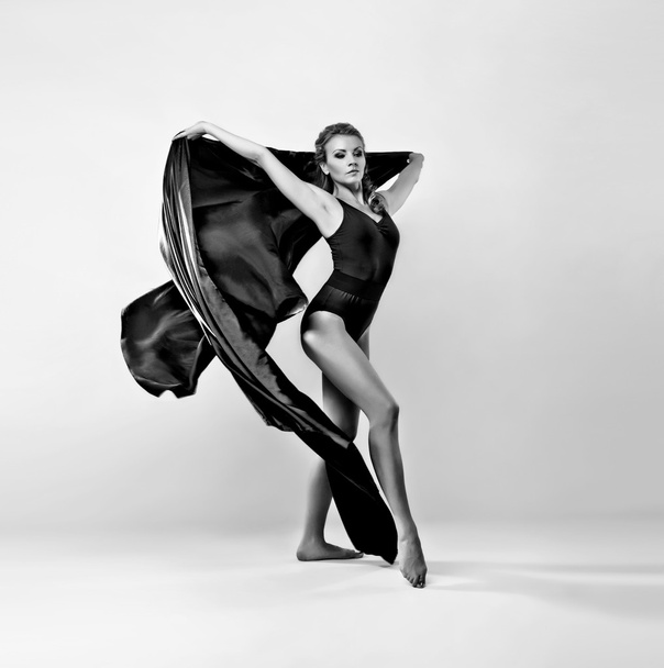 Gorgeous model with flying clothing - Zdjęcie, obraz