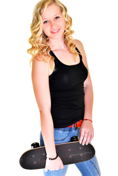 Jeune femme avec planche à roulettes
 - Photo, image