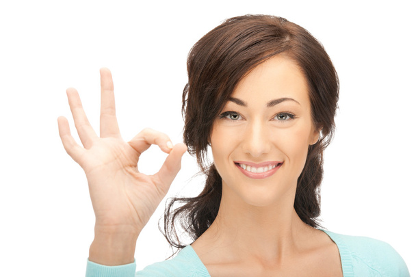 Lovely teenage girl showing ok sign - Foto, immagini