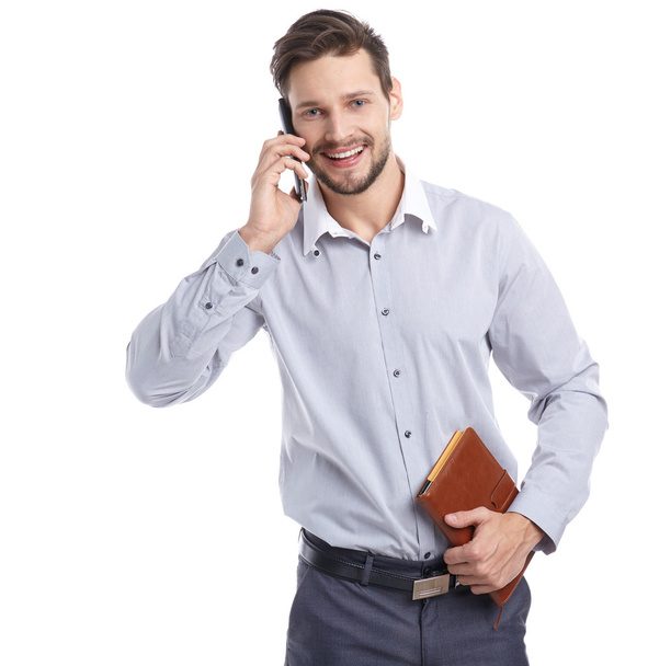 Young man talking on mobilephone - Photo, Image