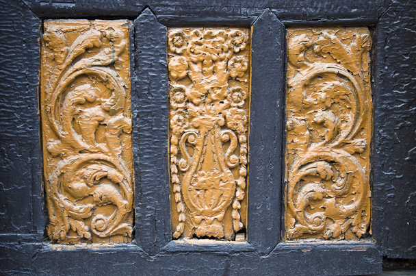 αρχαία Ξύλινη γλυπτική σε πόρτα φόντο - Φωτογραφία, εικόνα