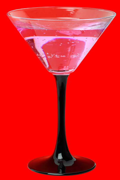 Martini glass on a red - Photo, Image