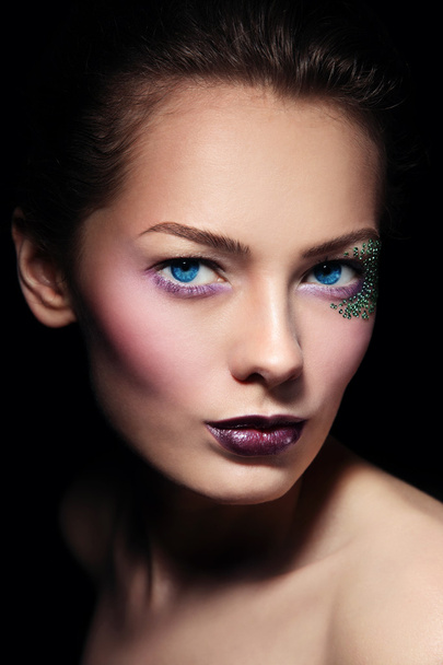 woman with stylish glitter make-up - Foto, Bild