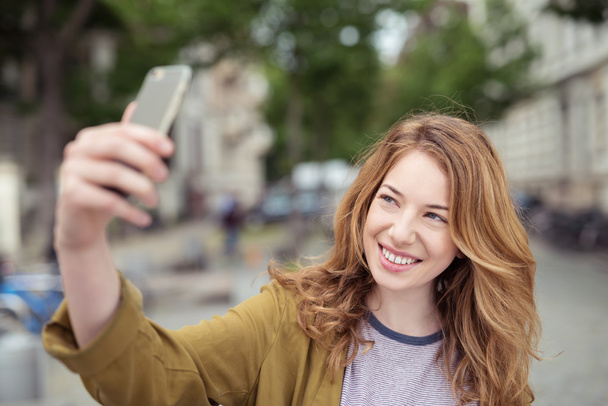Happy Blond Girl Taking Selfie Photo at the Street - Фото, зображення