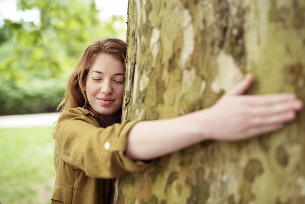 Thoughtful Teen Girl Hugging Huge Tree Trunk - Fotoğraf, Görsel
