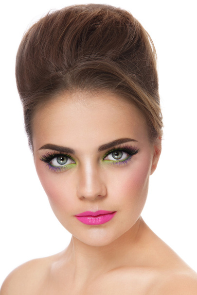 woman with colorful make-up and hair bun - Φωτογραφία, εικόνα