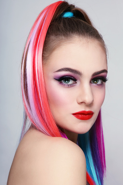 beautiful girl with colorful ponytail - Foto, Imagen