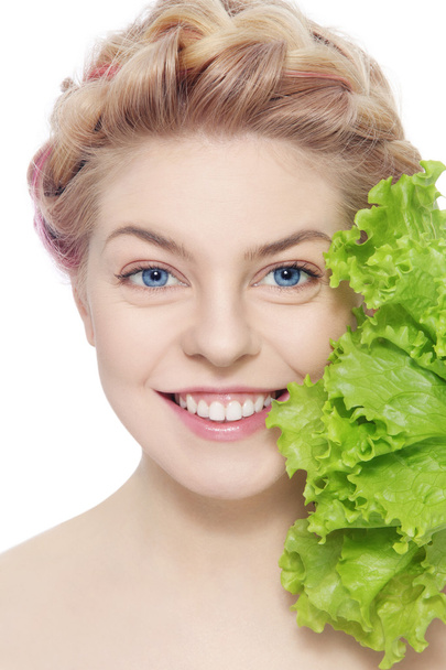 young blond girl with green salad - Фото, зображення