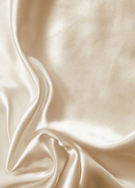 Golden silk cloth with folds - Foto, afbeelding