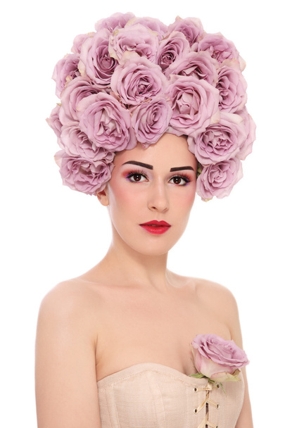 woman with fancy wig of fresh roses - Zdjęcie, obraz