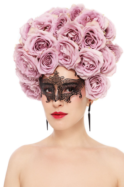 woman with flower wig and venetian mask - 写真・画像