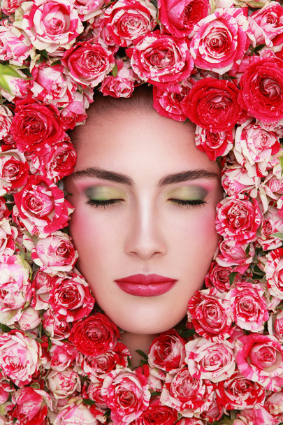 dreaming woman with fancy make-up and roses - Foto, afbeelding