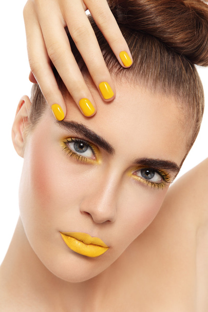 woman with fancy yellow make-up and manicure - Foto, immagini