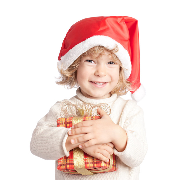 Happy child with Christmas gift - Фото, изображение
