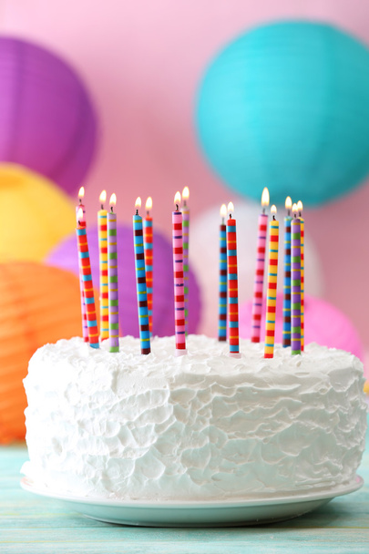 Birthday cake with candles on colorful background - Valokuva, kuva