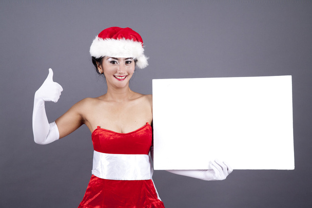 Beautiful Woman in Christmas Lingerie with a Blank Sign - Fotoğraf, Görsel