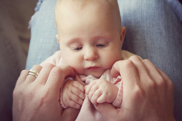 Infant Girl Holding Fathers Hands - 写真・画像