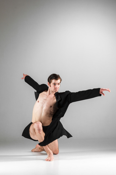 The young attractive modern ballet dancer on white background - Valokuva, kuva