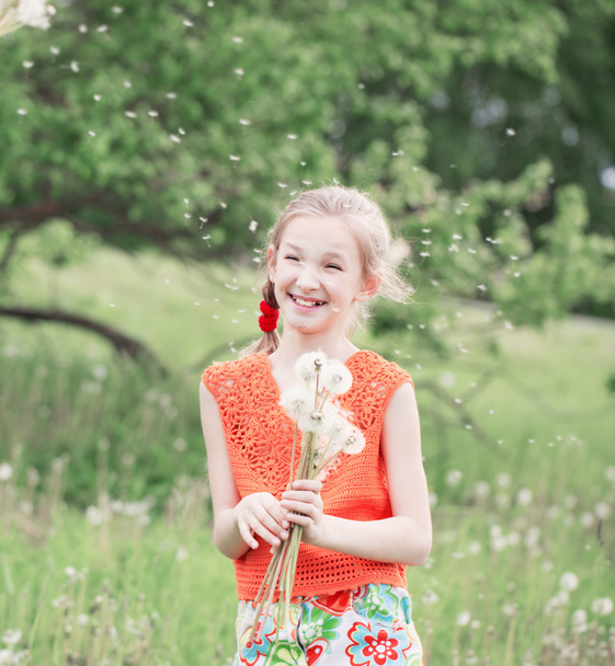 beautiful girl with dandelions - Photo, Image
