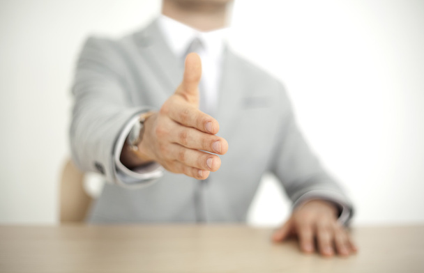 Businessman extending his hand - Photo, Image