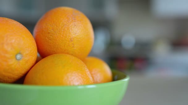 Three in wicker basket of oranges - Footage, Video