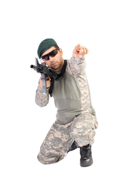 Portrait of soldier or commander holding his rifle and pointing - Foto, immagini