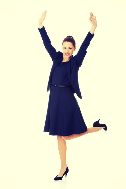 Young happy businesswoman with hands up - Foto, Imagem