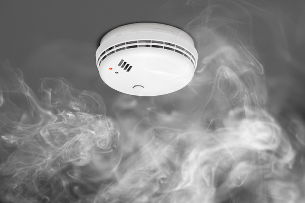 smoke detector of fire alarm in action - Photo, Image