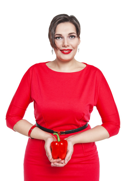 Beautiful plus size woman with red pepper isolated  - Φωτογραφία, εικόνα