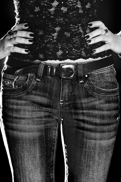 Slender woman in jeans - 写真・画像