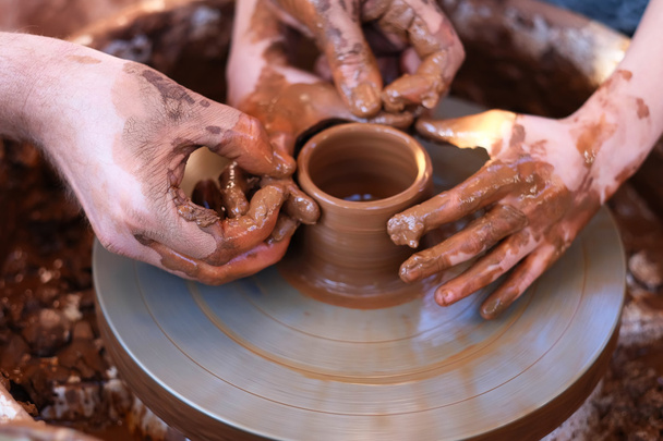 Hands working with clay - Photo, Image