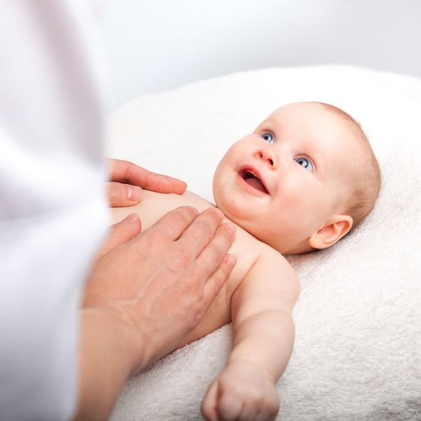 Infant chest massage - Photo, Image