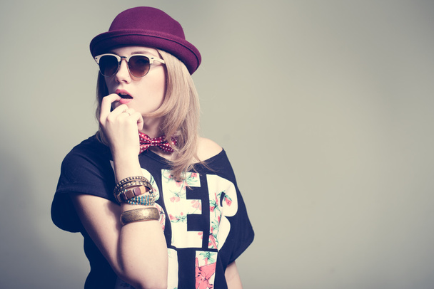 hipster girl wearing trendy hat - Fotó, kép