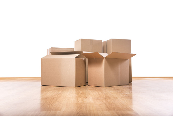 Moving boxes on the floor. - Photo, Image
