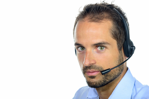 Operador de servicio al cliente guapo con auriculares
 - Foto, Imagen