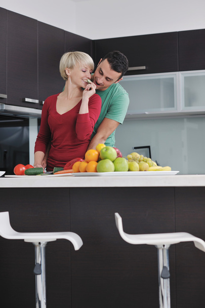 Young couple have fun in modern kitchen - Foto, Imagen