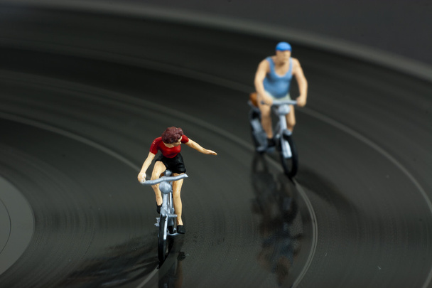 Two model people in cycle race - Photo, Image