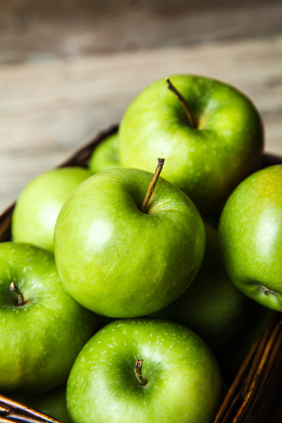 fruit. apples in a basket on wooden table - Φωτογραφία, εικόνα