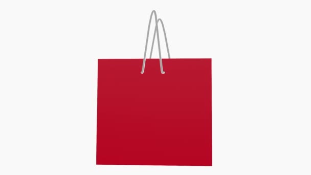κόκκινη τσάντα για ψώνια σε λευκό - Πλάνα, βίντεο