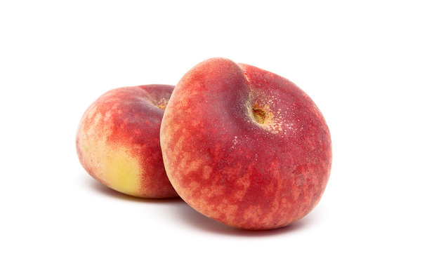 ripe peaches close-up on a white background - Φωτογραφία, εικόνα