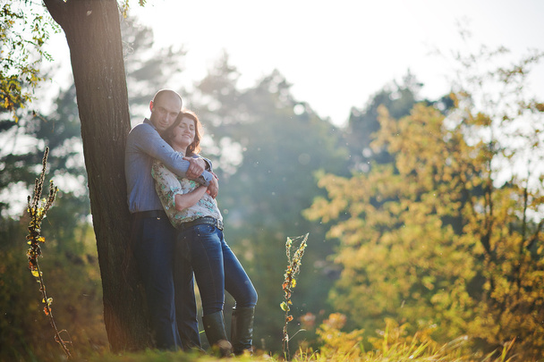 Happy and positive couple in autumn love story - Φωτογραφία, εικόνα