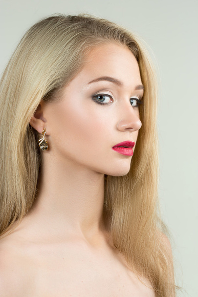 beautiful girl with red lips and earrings. fashion photo - Photo, Image