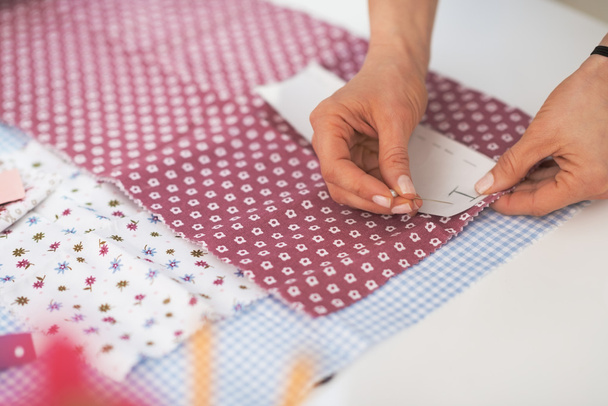 Closeup on tailor woman working with fabric - Φωτογραφία, εικόνα
