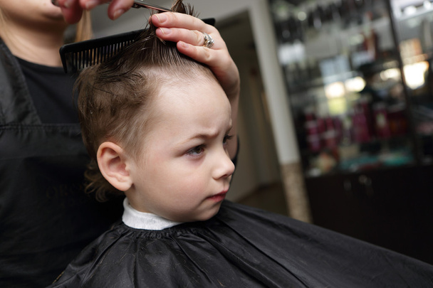 Serious kid at the barbershop - Fotoğraf, Görsel