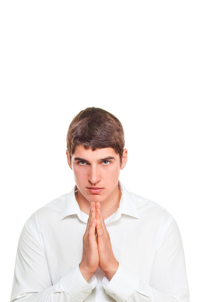 Junger Mann mit hellen Augen, Blondine betet - Foto, Bild