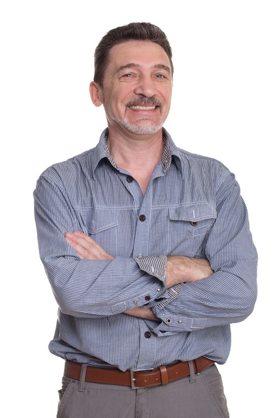 usmívající se muž středního věku s šedé tričko - Fotografie, Obrázek