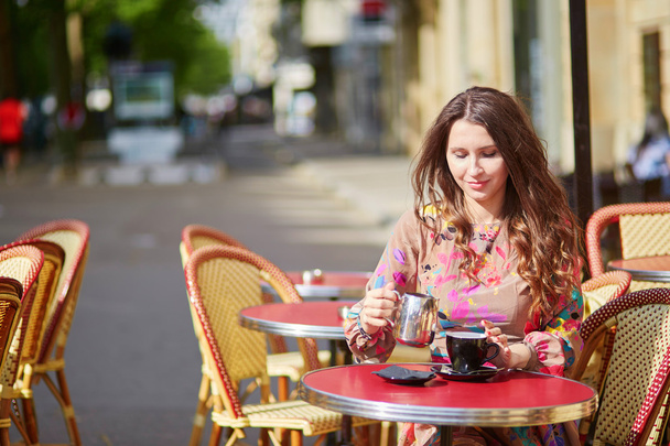 Beautiful young woman in cafe - Fotografie, Obrázek