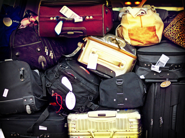 Luggage piled on top of each other - Photo, Image
