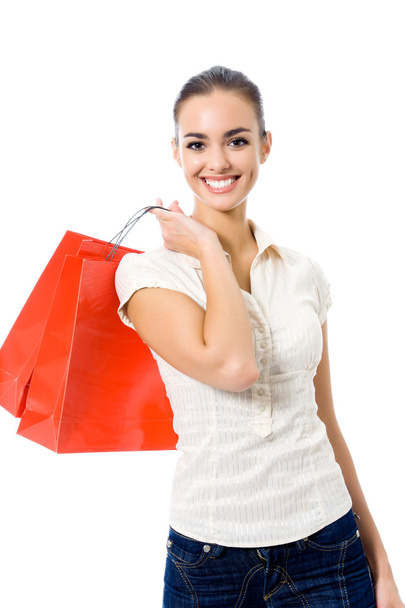 Young happy woman with shopping bags, isolated - Foto, immagini